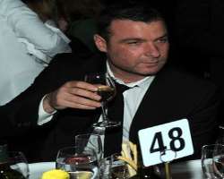 Liev Schreiber consuming alcohol